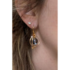 WEWDBY Handmade Cosmic Planet Art Earrings - Iridescent Hand-Mixed Resin Planet Design, 3D Metal Ring Surrounding, Lightweight & Hypoallergenic, Creative Jewelry for Women, Unique Gift for Sci-Fi & Art Enthusiasts